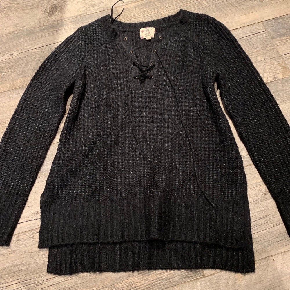 Black sweater with tied up laces in the front